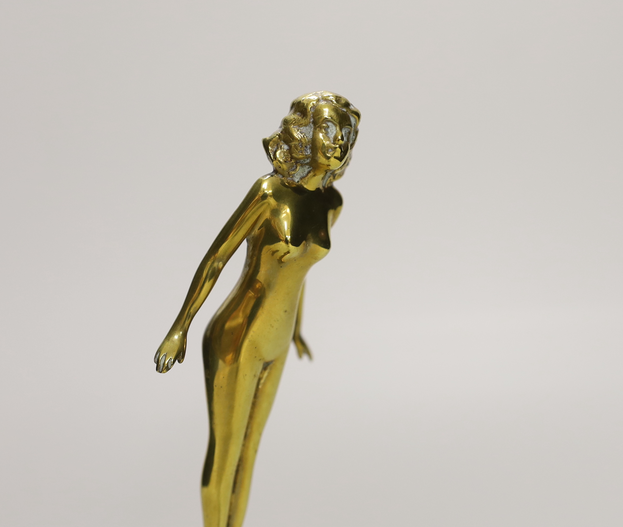 An Art Deco novelty brass table-lighter, nude female, 20cm high
